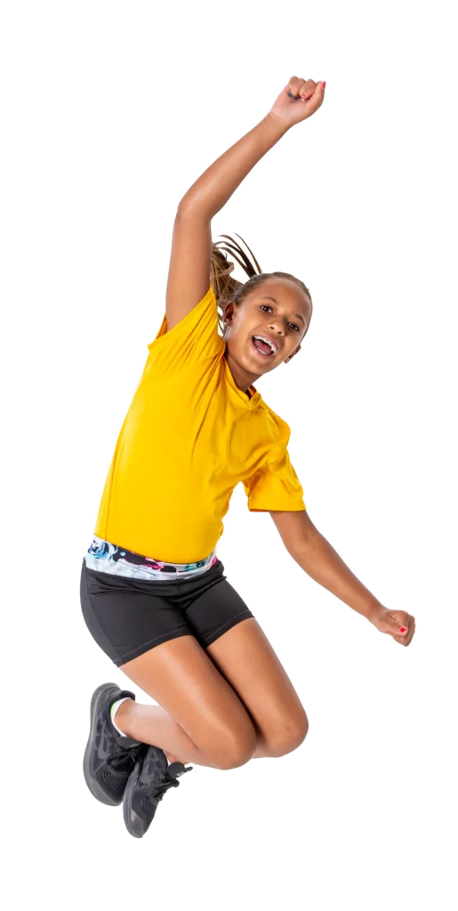 Student jumping in physical education class